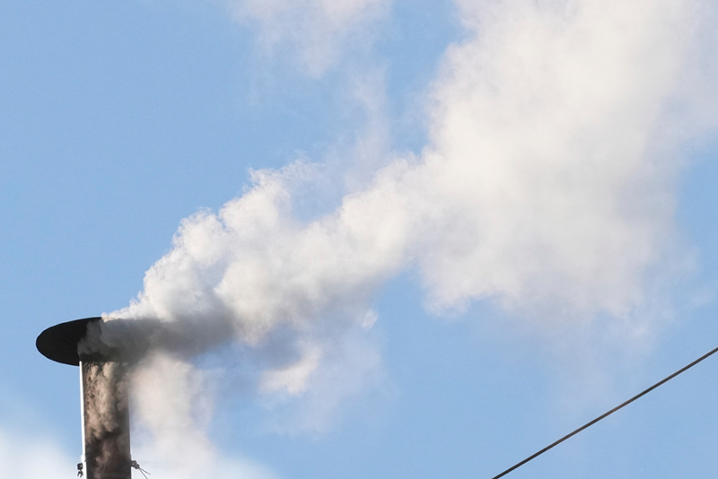 photo of white smoke from conclave chimney